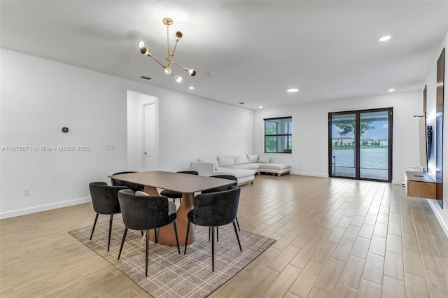 dining room with a notable chandelier