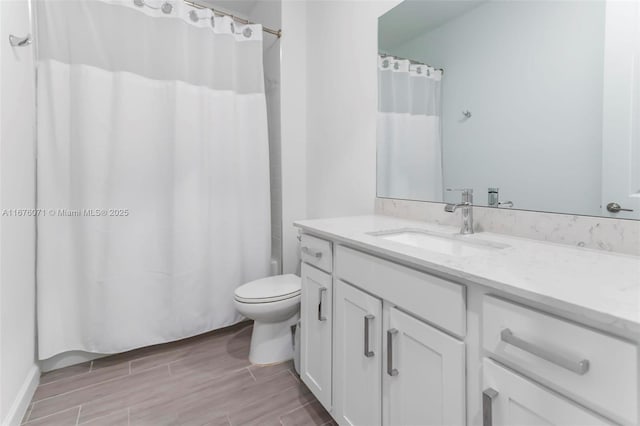 full bathroom featuring vanity, toilet, and shower / tub combo with curtain