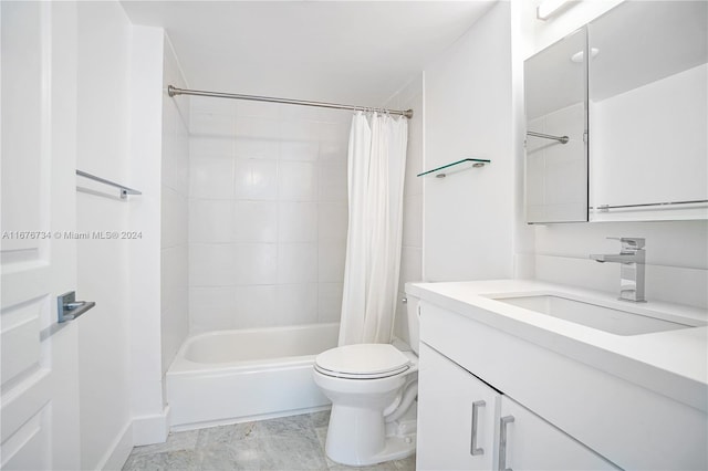 full bathroom featuring vanity, toilet, and shower / bath combination with curtain