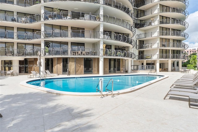 view of pool with a patio