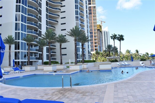 view of pool with a patio