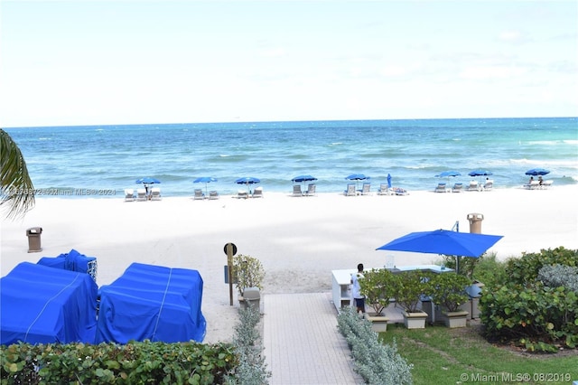 view of water feature with a beach view