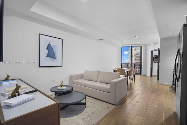 living room with hardwood / wood-style flooring