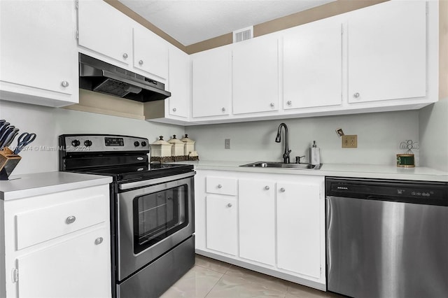 kitchen featuring white cabinetry, stainless steel appliances, and sink