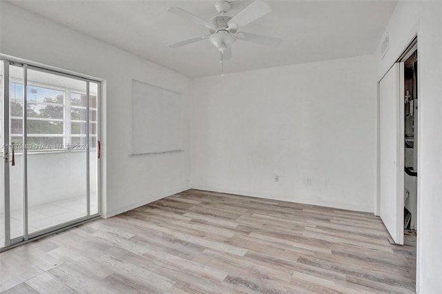 121 NE 204th St Unit 9, Miami Gardens, FL 33179 - empty room featuring light wood finished floors and ceiling fan