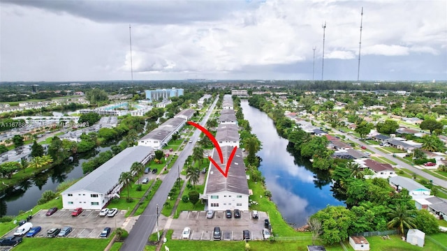 bird's eye view with a water view