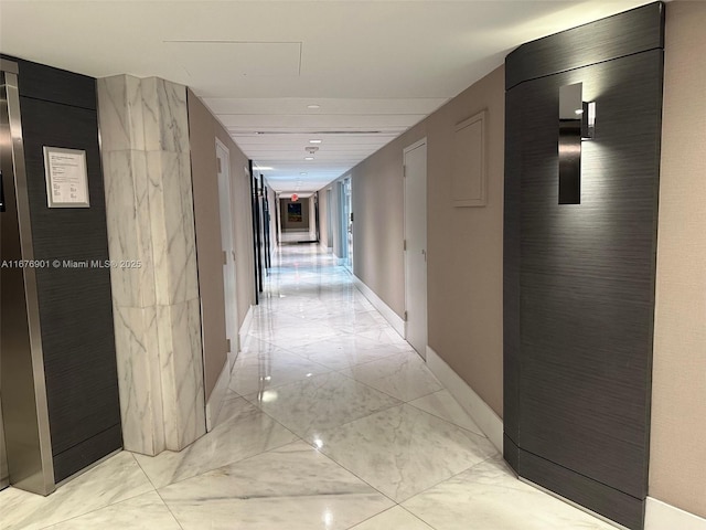 3300 NE 192nd St Unit 414, Aventura, FL 33180 - corridor featuring light marble finish floors and elevator
