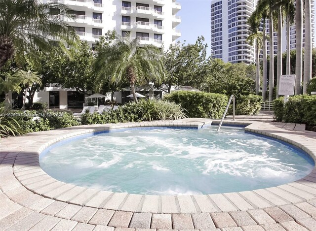 3300 NE 192nd St Unit 414, Aventura, FL 33180 - view of swimming pool featuring a community hot tub