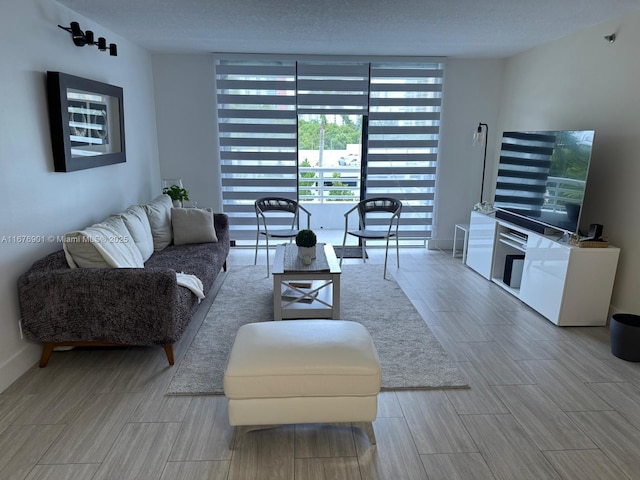 3300 NE 192nd St Unit 414, Aventura, FL 33180 - living area with floor to ceiling windows and wood finish floors
