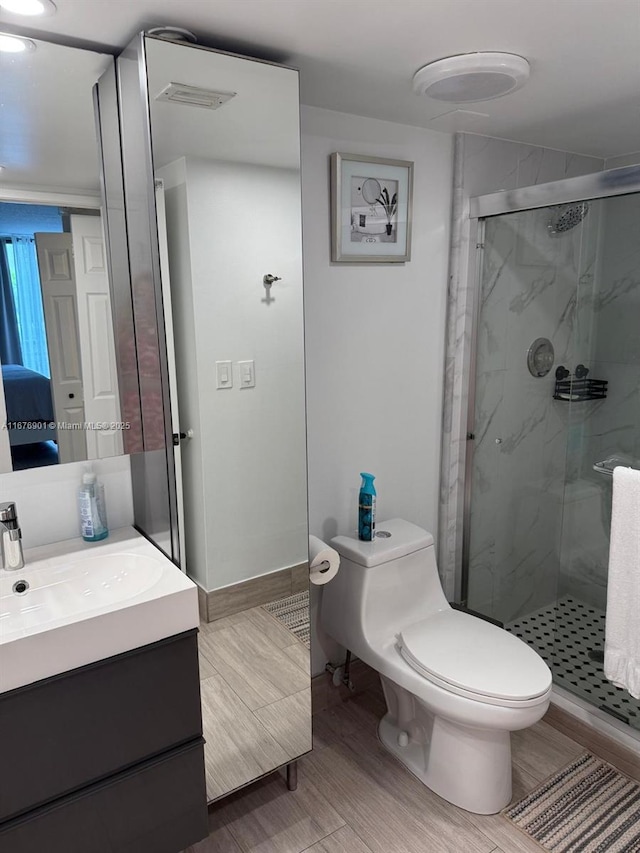 3300 NE 192nd St Unit 414, Aventura, FL 33180 - full bath with a marble finish shower, vanity, and wood finished floors