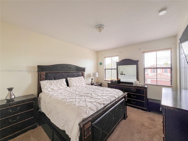 bedroom with light carpet