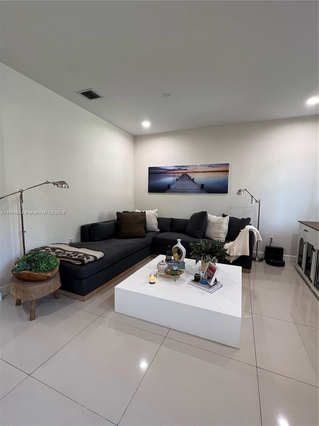 living room with light tile patterned floors