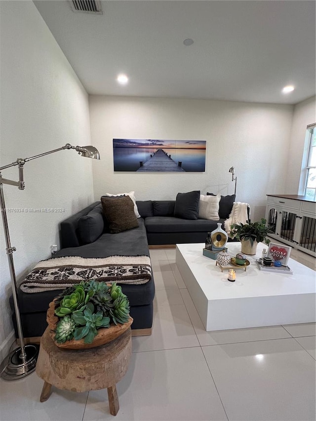 living room with light tile patterned flooring