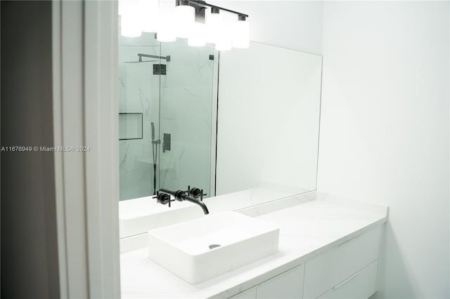 bathroom featuring vanity and walk in shower