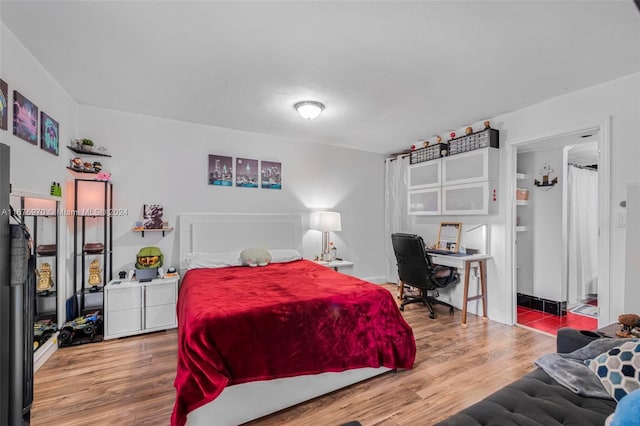 bedroom featuring hardwood / wood-style floors