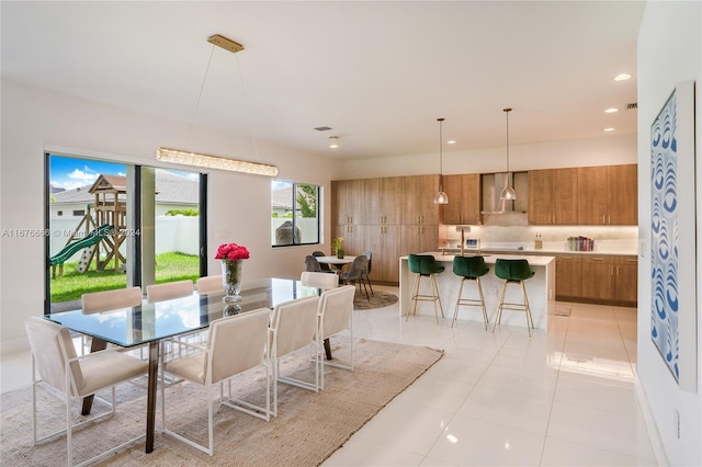 dining room with light tile patterned floors