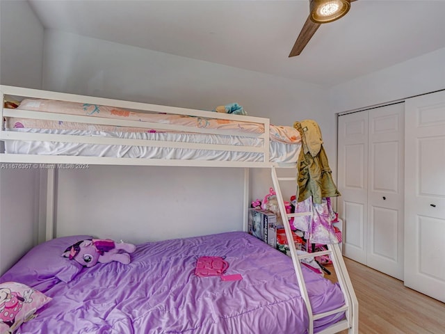 bedroom featuring a closet, ceiling fan, and hardwood / wood-style flooring