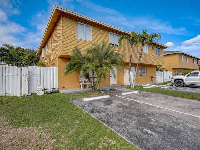 exterior space with a front yard