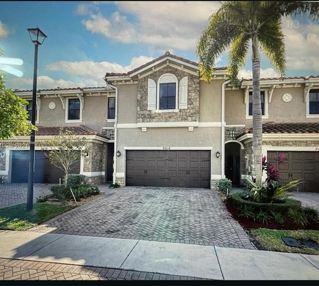 view of front of home with a garage