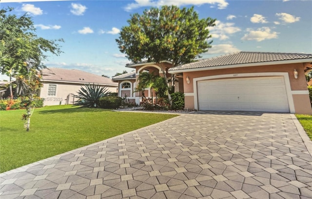 view of front of property with a garage and a front yard