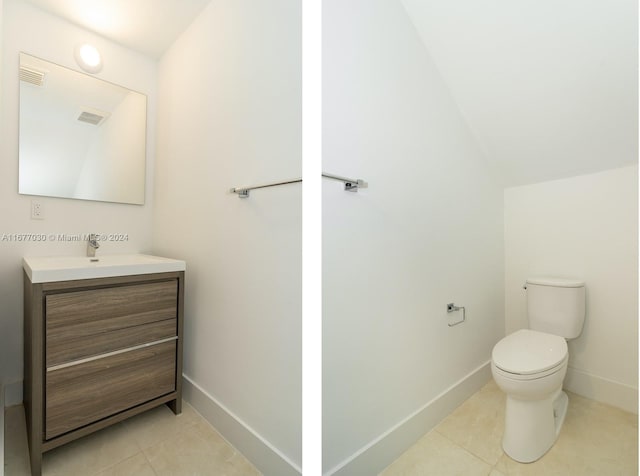 bathroom with vanity, toilet, tile patterned floors, and lofted ceiling