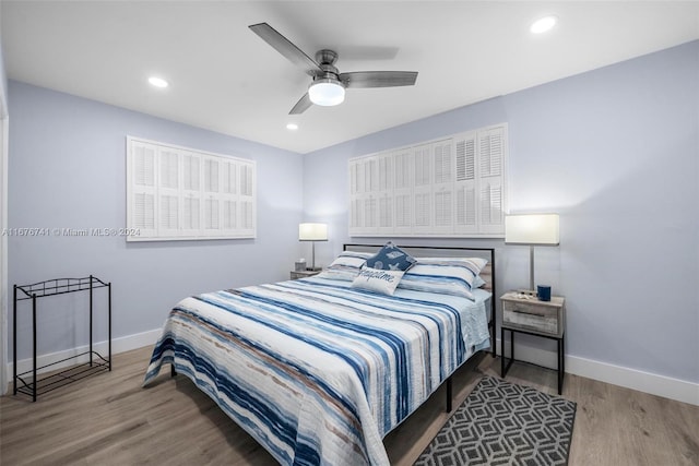 bedroom featuring ceiling fan and wood-type flooring