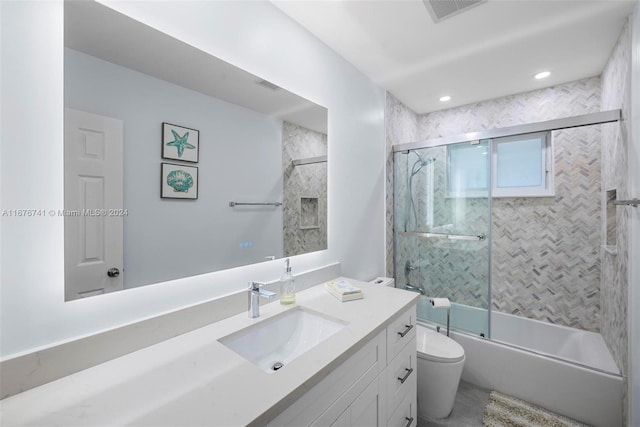 full bathroom featuring vanity, toilet, and enclosed tub / shower combo