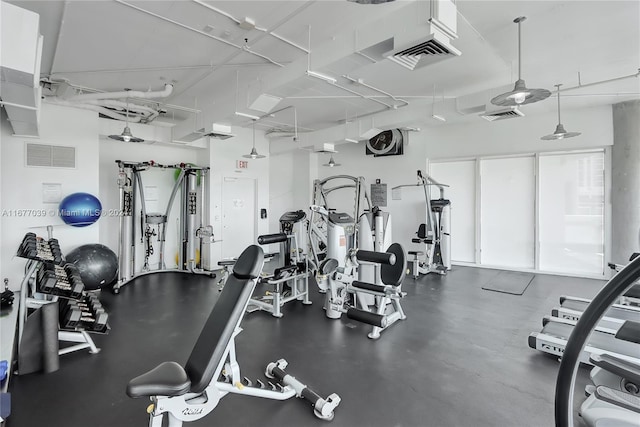 gym featuring a high ceiling