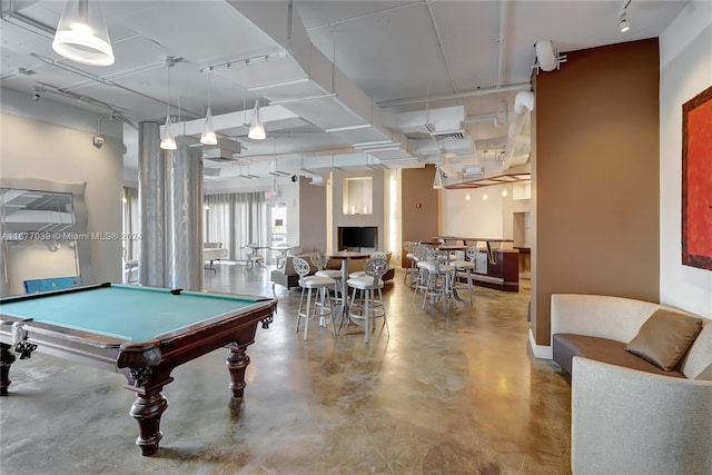 playroom with billiards and concrete flooring