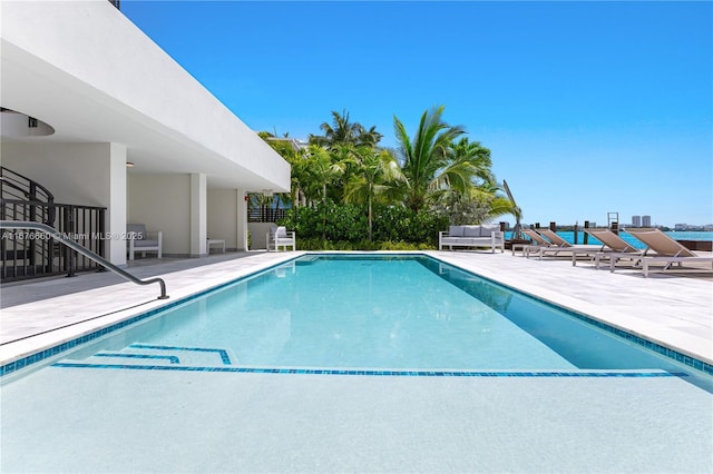 pool with a patio