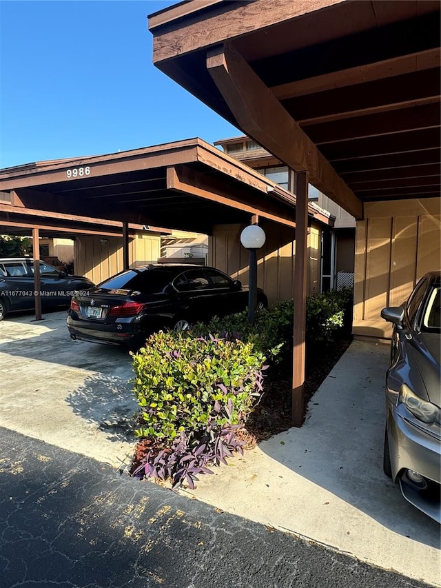 view of parking with a carport