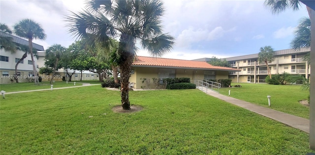 view of front of home with a front lawn