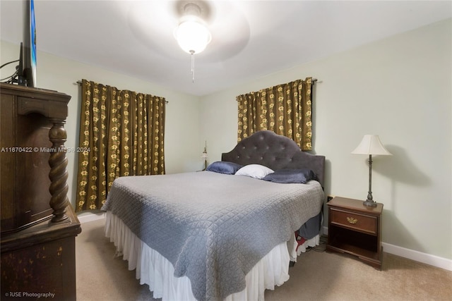 bedroom with light colored carpet