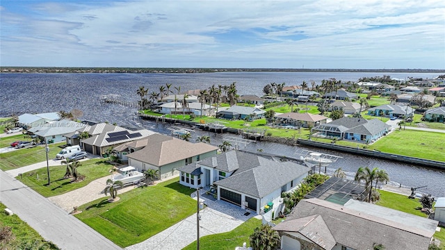 birds eye view of property featuring a water view