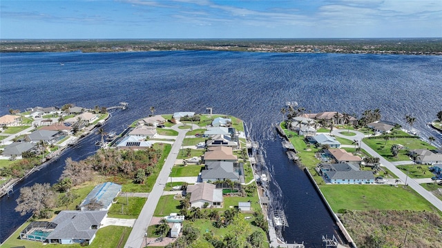 drone / aerial view with a water view