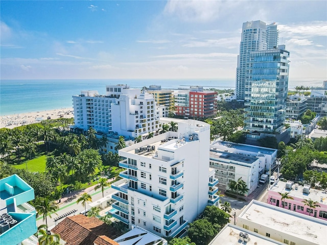 aerial view with a view of the beach and a water view