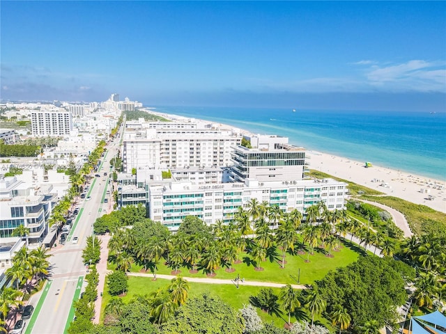 aerial view featuring a water view and a beach view