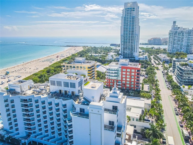 drone / aerial view with a view of the beach and a water view