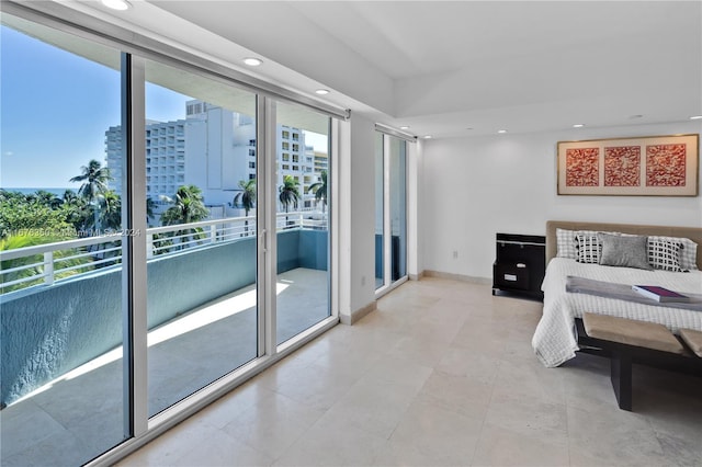 bedroom featuring access to exterior and multiple windows