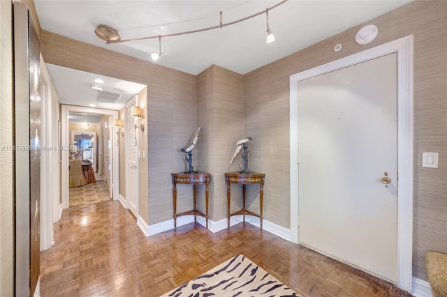 corridor featuring light parquet flooring