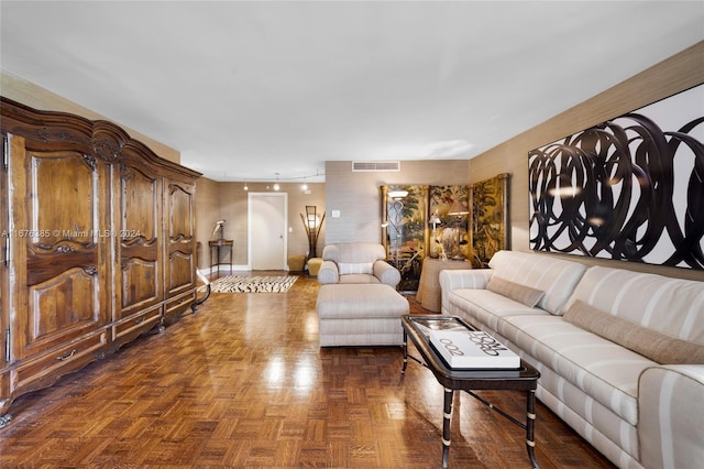 living room featuring dark parquet floors