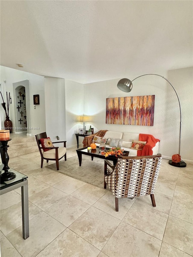 living room featuring tile patterned flooring