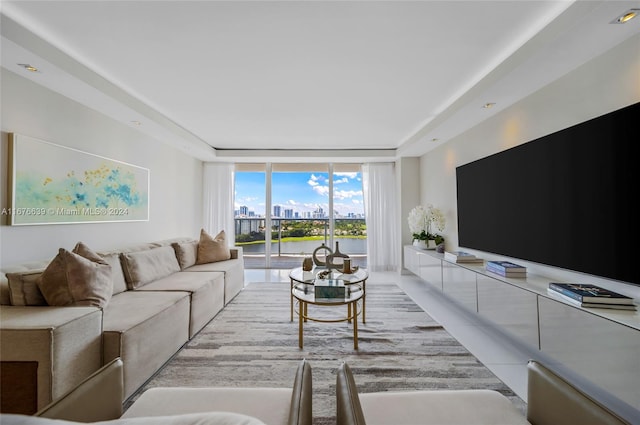 tiled living room with expansive windows