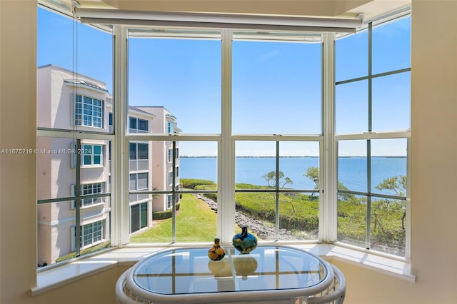 sunroom with a water view