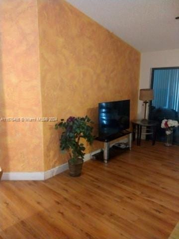 living room with hardwood / wood-style floors