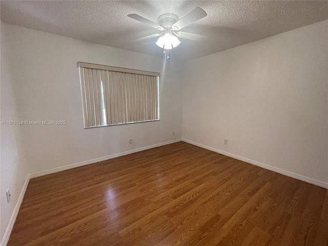 empty room featuring wood-type flooring, a textured ceiling, and ceiling fan