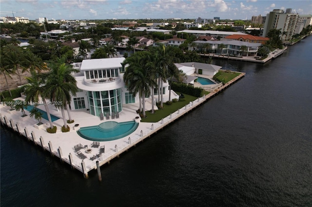 drone / aerial view with a water view