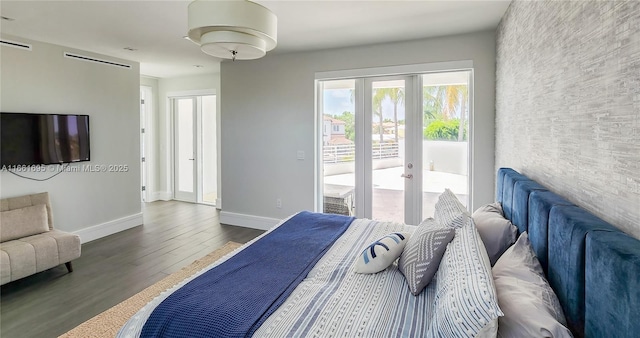 bedroom featuring access to outside, french doors, and dark hardwood / wood-style floors