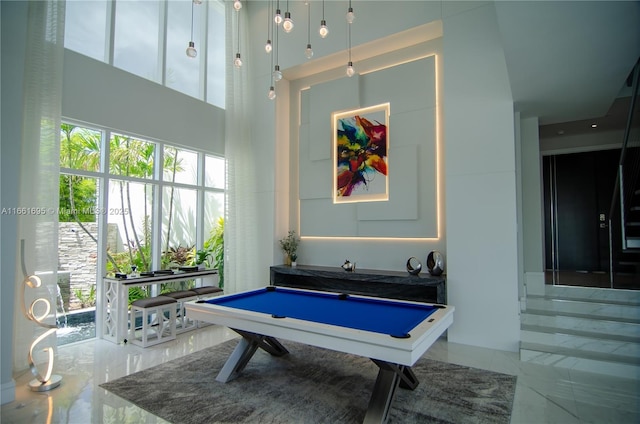 playroom featuring billiards and a high ceiling