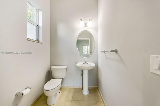 bathroom featuring tile patterned floors, sink, and toilet